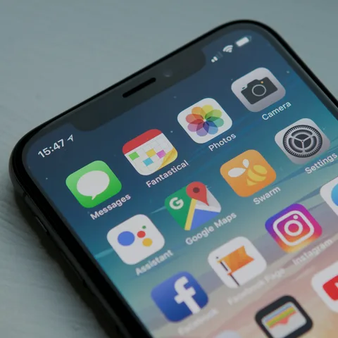 iPhone home screen full of app icons